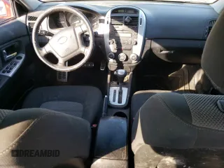 2007 Kia Spectra with VIN KNAFE162X75009714, listed as a Copart auction lot 69094894 with 206,173 mi miles and Salvage Title. Bid and sale history available at carsss.com. Image 8.