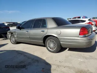 2002 Ford Crown Victoria Standard с VIN 2FAFP73WX2X103936, выставлен на аукционе Copart как лот 67688374 с пробегом 161 511 миль миль и Списание • Salvage title. История ставок и продаж доступна на DreamBid. Изображение 2.
