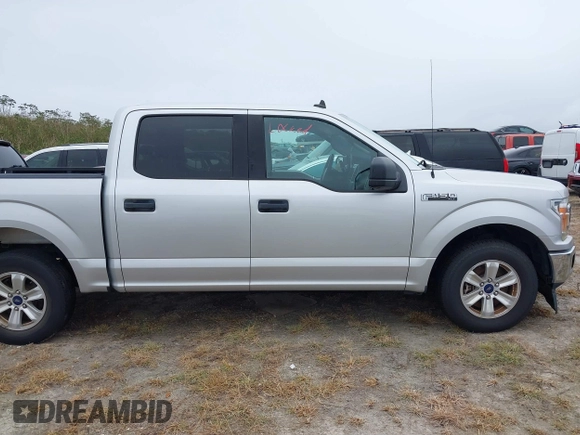 2019 Ford F-150 XL with VIN 1FTEW1C52KKC39798, listed as a IAAI auction lot 40537962 with Not Provided miles and . Bid and sale history available at DreamBid. Image 13.