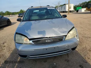 2005 Ford Focus SE with VIN 1FAFP36N55W155129, listed as a Copart auction lot 52940795 with 111,400 mi miles and Salvage Title. Bid and sale history available at carsss.com. Image 5.