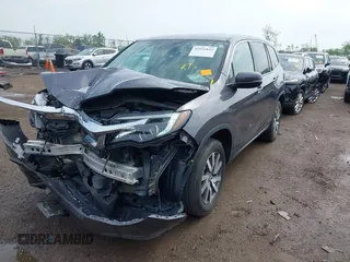 2019 Honda Pilot EX-L with VIN 5FNYF6H57KB053786, listed as a IAAI auction lot 42161832 with 89,326 mi miles and . Bid and sale history available at carsss.com. Image 2.
