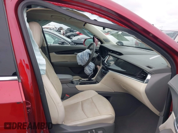 2020 Cadillac XT6 FWD Premium Luxury with VIN 1GYKPCRSXLZ133207, listed as a IAAI auction lot 41733269 with 82,853 mi miles and . Bid and sale history available at DreamBid. Image 5.