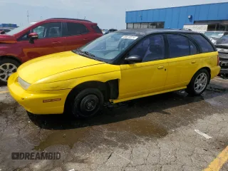 1999 Saturn SW z VIN 1G8ZK8279XZ197938, wystawiony jako Copart lot #68818514 z przebiegiem Nie podano mil oraz Tytuł czysty. Historia ofert i sprzedaży dostępna na DreamBid. Obrazek 1.
