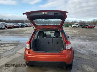 2013 Suzuki SX4 Crossover with VIN JS2YB5A37D6100222, listed as a Copart auction lot 86614504 with 131,930 mi miles and Salvage Title. Bid and sale history available at carsss.com. Image 6.