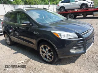 2016 Ford Escape Titanium with VIN 1FMCU9JX1GUC18335, listed as a IAAI auction lot 42396492 with 147,522 mi miles and . Bid and sale history available at DreamBid. Image 1.