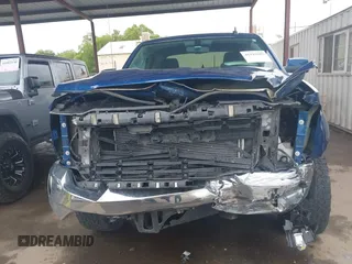 2017 Chevrolet Silverado 1500 LT with VIN 3GCPCREC5HG119019, listed as a IAAI auction lot 41949285 with 104,583 mi miles. Bid and sale history available at carsss.com. Image 13.