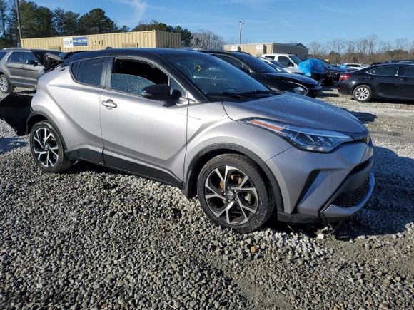 2020 Toyota C-HR LE with VIN NMTKHMBXXLR111433, listed as a Copart auction lot 88360655 with 97,544 mi miles and Salvage Title. Bid and sale history available at carsss.com. Image 4.