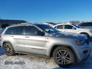 2017 Jeep Grand Cherokee Trailhawk with VIN 1C4RJFLT4HC657682, listed as a IAAI auction lot 41286507 with 123,646 mi miles and . Bid and sale history available at DreamBid. Image 13.