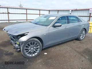 2018 Cadillac CT6 Luxury AWD z VIN 1G6KD5RS6JU101040, wystawiony jako IAAI lot #42271248 z przebiegiem 88 470 mil mil oraz . Historia ofert i sprzedaży dostępna na DreamBid. Obrazek 2.