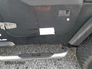 2003 Jeep Wrangler X with VIN 1J4FA39S73P340698, listed as a Copart auction lot 73888624 with 49,677 mi miles and Salvage Title. Bid and sale history available at carsss.com. Image 13.