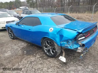 2015 Dodge Challenger R/T with VIN 2C3CDZAT6FH878216, listed as a IAAI auction lot 41304913 with 104,176 mi miles. Bid and sale history available at carsss.com. Image 3.