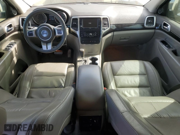 2012 Jeep Grand Cherokee Laredo with VIN 1C4RJEAG0CC222943, listed as a Copart auction lot 52899545 with 153,389 mi miles and Salvage Title. Bid and sale history available at carsss.com. Image 8.