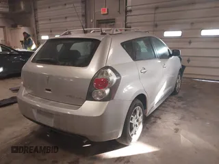 2009 Pontiac Vibe with VIN 5Y2SM67009Z422428, listed as a IAAI auction lot 41356815 with 63,924 mi miles. Bid and sale history available at carsss.com. Image 4.