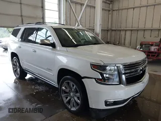 2016 Chevrolet Tahoe LTZ z VIN 1GNSKCKC9GR256033, wystawiony jako IAAI lot #42323932 z przebiegiem 164 797 mil mil oraz . Historia ofert i sprzedaży dostępna na DreamBid. Obrazek 1.
