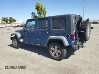 2010 Jeep Wrangler Unlimited Rubicon with VIN 1J4HA6H15AL225234, listed as a Copart auction lot 61270505 with 110,332 mi miles and Clean title. Bid and sale history available at DreamBid. Image 2.