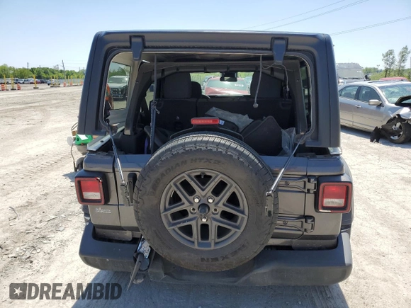 2024 Jeep Wrangler Sport S with VIN 1C4PJXDN4RW102311, listed as a Copart auction lot 56407235 with 23,851 mi miles and Salvage title. Bid and sale history available at DreamBid. Image 6.