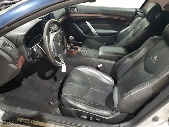2009 Infiniti G37 Convertible with VIN JNKCV66E49M723102, listed as a Copart auction lot 69674134 with 186,596 mi miles and Salvage Title. Bid and sale history available at carsss.com. Image 7.