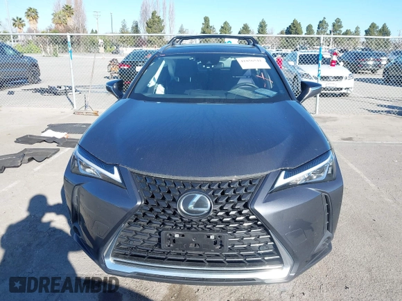 2022 Lexus UX with VIN JTHX3JBH6N2056436, listed as a IAAI auction lot 41856541 with 12,815 mi miles. Bid and sale history available at carsss.com. Image 12.