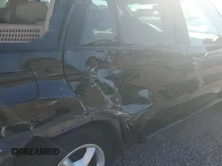 2003 BMW X5 3.0i with VIN 5UXFA53563LV96891, listed as a Copart auction lot 77636084 with 0 mi miles and Salvage Title. Bid and sale history available at carsss.com. Image 11.
