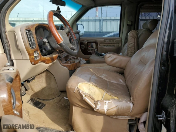 1999 GMC Savana Cargo Van YF7 Upfitter with VIN 1GDFG15R0X1070603, listed as a Copart auction lot 77944014 with 0 mi miles and Clean Title. Bid and sale history available at carsss.com. Image 7.