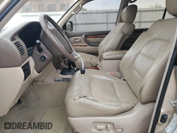 1999 Lexus LX 470 with VIN JT6HT00W2X0043805, listed as a Copart auction lot 54496735 with 520,244 mi miles and Clean Title. Bid and sale history available at DreamBid. Image 7.