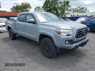 2020 Toyota Tacoma SR5 with VIN 3TMDZ5BN1LM084795, listed as a IAAI auction lot 41870689 with 16,817 mi miles and . Bid and sale history available at DreamBid. Image 1.