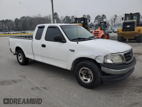 2000 Ford F-150 XL с VIN 1FTZX1725YNB58607, выставлен на аукционе Copart как лот 48706575 с пробегом 286 898 миль миль и Списание • Salvage title. История ставок и продаж доступна на DreamBid. Изображение 4.