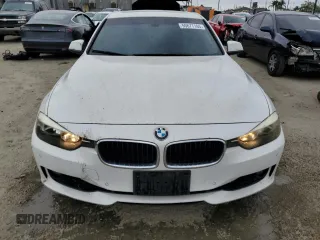 2013 BMW 3 Series 328i with VIN WBA3A5G57DNP23598, listed as a Copart auction lot 55677165 with 217,977 mi miles and Clean Title. Bid and sale history available at carsss.com. Image 5.
