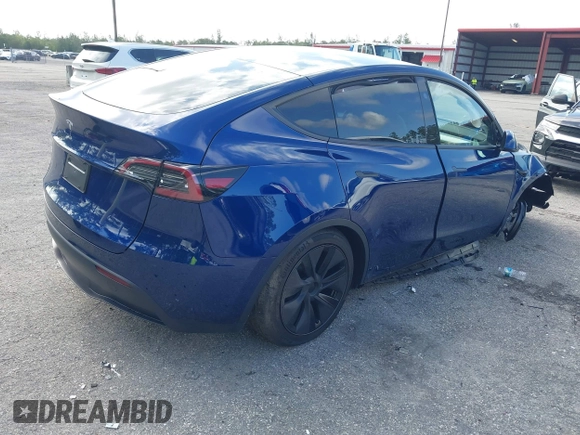 2025 Tesla Model Y Long Range z VIN 7SAYGDED0SF256650, wystawiony jako IAAI lot #41993206 z przebiegiem Nie podano mil oraz . Historia ofert i sprzedaży dostępna na DreamBid. Obrazek 4.
