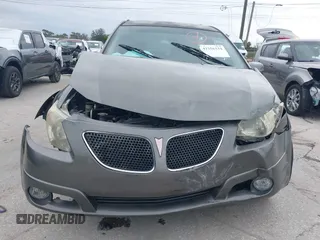 2007 Pontiac Vibe with VIN 5Y2SL65827Z427154, listed as a IAAI auction lot 41356334 with 105,526 mi miles. Bid and sale history available at carsss.com. Image 6.