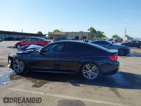 2015 BMW 4 Series 435i with VIN WBA4B1C54FD418309, listed as a IAAI auction lot 42099401 with 119,982 mi miles and . Bid and sale history available at carsss.com. Image 14.