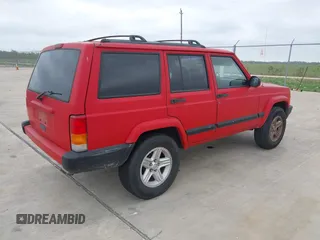 2001 Jeep Cherokee Sport with VIN 1J4FT48S01L537833, listed as a IAAI auction lot 41943255 with 239,473 mi miles. Bid and sale history available at carsss.com. Image 4.