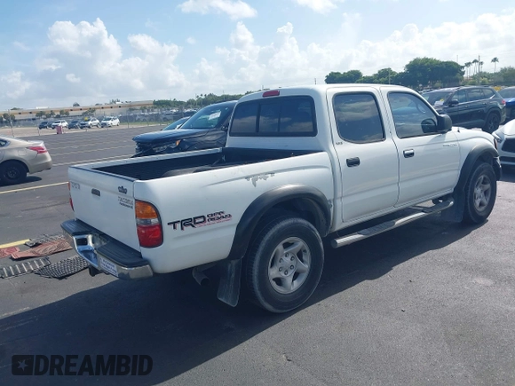 2002 Toyota Tacoma PreRunner with VIN 5TEGN92N62Z085250, listed as a IAAI auction lot 42507137 with 311,429 mi miles and . Bid and sale history available at DreamBid. Image 4.
