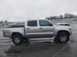 2014 Toyota Tacoma with VIN 3TMLU4EN2EM161239, listed as a IAAI auction lot 41536944 with 136,299 mi miles. Bid and sale history available at carsss.com. Image 13.