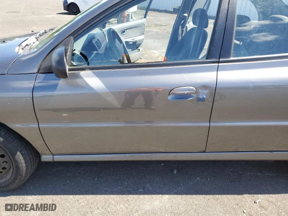 2004 Kia Rio with VIN KNADC125946330310, listed as a Copart auction lot 69411894 with 198,704 mi miles and Salvage Title. Bid and sale history available at carsss.com. Image 7.