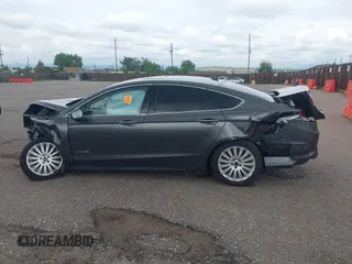 2016 Ford Fusion SE Hybrid with VIN 3FA6P0LU1GR191528, listed as a IAAI auction lot 42283058 with Not provided miles and . Bid and sale history available at DreamBid. Image 13.