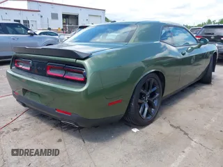 2022 Dodge Challenger GT z VIN 2C3CDZJG8NH164430, wystawiony jako IAAI lot #42009482 z przebiegiem 56 113 mil mil oraz . Historia ofert i sprzedaży dostępna na DreamBid. Obrazek 4.
