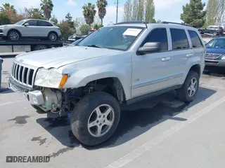 2006 Jeep Grand Cherokee Laredo with VIN 1J4GR48K46C308811, listed as a IAAI auction lot 42044167 with 190,613 mi miles. Bid and sale history available at carsss.com. Image 2.