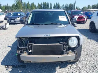 2016 Jeep Patriot Latitude with VIN 1C4NJPFA2GD633341, listed as a IAAI auction lot 42403814 with 98,768 mi miles and . Bid and sale history available at DreamBid. Image 13.