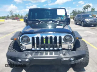 2016 Jeep Wrangler Unlimited Sport z VIN 1C4BJWDG4GL327638, wystawiony jako IAAI lot #42494615 z przebiegiem 139 371 mil mil oraz . Historia ofert i sprzedaży dostępna na DreamBid. Obrazek 12.