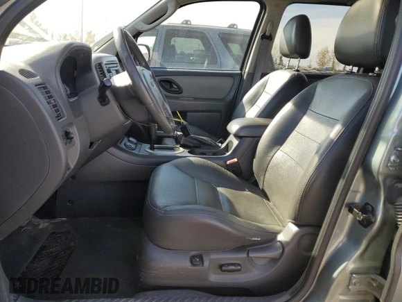 2006 Ford Escape Hybrid with VIN 1FMYU96HX6KD19701, listed as a Copart auction lot 75206954 with 211,729 mi miles and Clean Title. Bid and sale history available at carsss.com. Image 7.