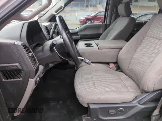 2018 Ford F-150 XL with VIN 1FTEW1E57JKC62666, listed as a Copart auction lot 61619235 with 149,759 mi miles and Clean title. Bid and sale history available at DreamBid. Image 7.