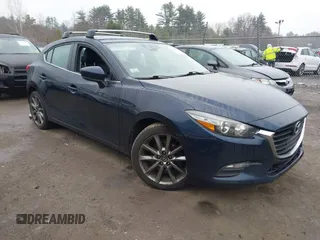 2018 Mazda 3 Touring with VIN 3MZBN1L34JM204883, listed as a IAAI auction lot 41094541 with 125,205 mi miles and . Bid and sale history available at DreamBid. Image 1.