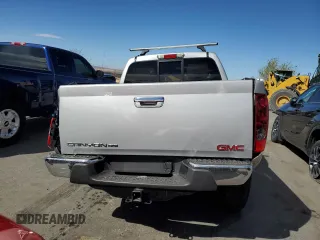 2010 GMC Canyon z VIN 1GTJTFDP2A8135909, wystawiony jako Copart lot #48905005 z przebiegiem Nie podano mil oraz Szkoda całkowita • Salvage title. Historia ofert i sprzedaży dostępna na DreamBid. Obrazek 6.