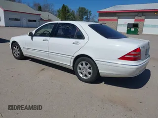 2001 Mercedes-Benz S with VIN WDBNG70J81A166750, listed as a IAAI auction lot 42168436 with 149,258 mi miles. Bid and sale history available at carsss.com. Image 3.