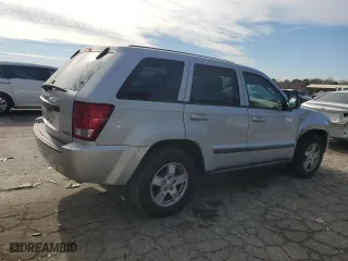 2007 Jeep Grand Cherokee Laredo with VIN 1J8HS48P57C697382, listed as a Copart auction lot 87682865 with 154,732 mi miles and Salvage Title. Bid and sale history available at carsss.com. Image 3.
