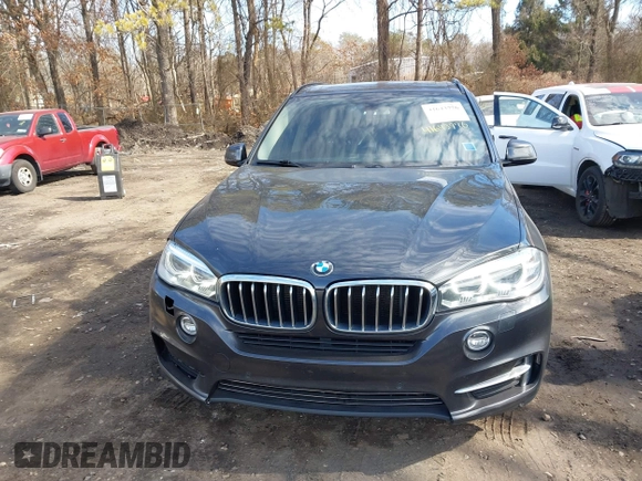2014 BMW X5 xDrive35i with VIN 5UXKR0C55E0K47655, listed as a IAAI auction lot 41643776 with 154,380 mi miles. Bid and sale history available at carsss.com. Image 12.
