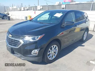 2020 Chevrolet Equinox LT with VIN 2GNAXJEV7L6259159, listed as a IAAI auction lot 42439744 with 90,670 mi miles and . Bid and sale history available at DreamBid. Image 2.