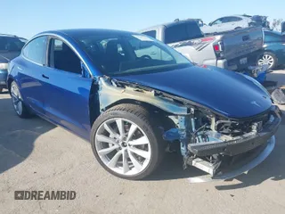 2019 Tesla Model 3 Long Range with VIN 5YJ3E1EB3KF497841, listed as a IAAI auction lot 41969728 with 21,127 mi miles. Bid and sale history available at carsss.com. Image 1.