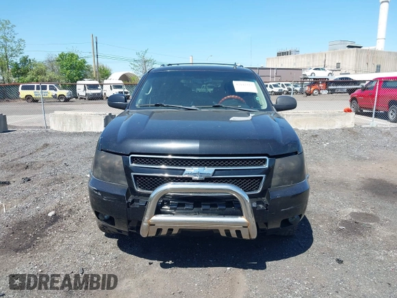 2012 Chevrolet Suburban LT with VIN 1GNSCJE09CR168533, listed as a IAAI auction lot 42142325 with 250,582 mi miles. Bid and sale history available at carsss.com. Image 12.